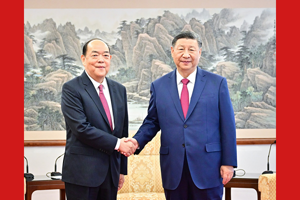 習近平會見賀一誠